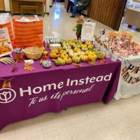 home instead seward, ne booth at pumpkin painting contest