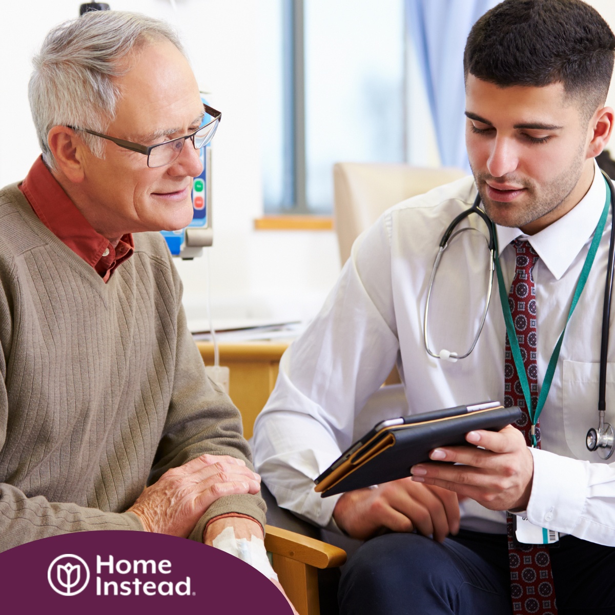 An older man talks with a doctor representing the effective communication that family caregivers should endeavor to have.