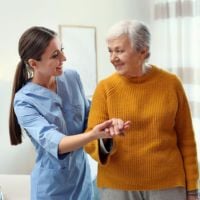 two ladies sharing a warm smile