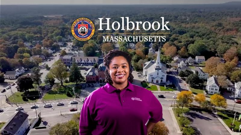 Home Instead caregiver with Holbrook Massachusetts in the background