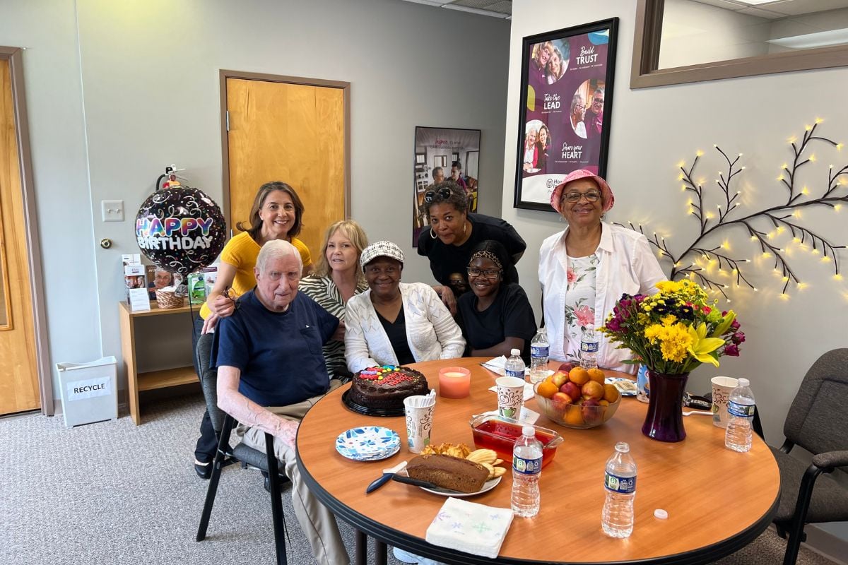 home instead of ann arbor michigan team members sitting together at table