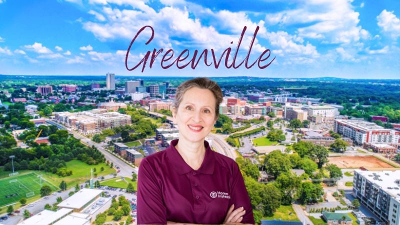 Home Instead caregiver with Greenville SC in the background