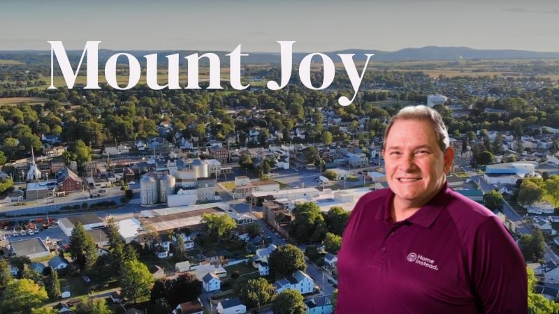 Home Instead caregiver with Mount Joy, Pennsylvania in the background