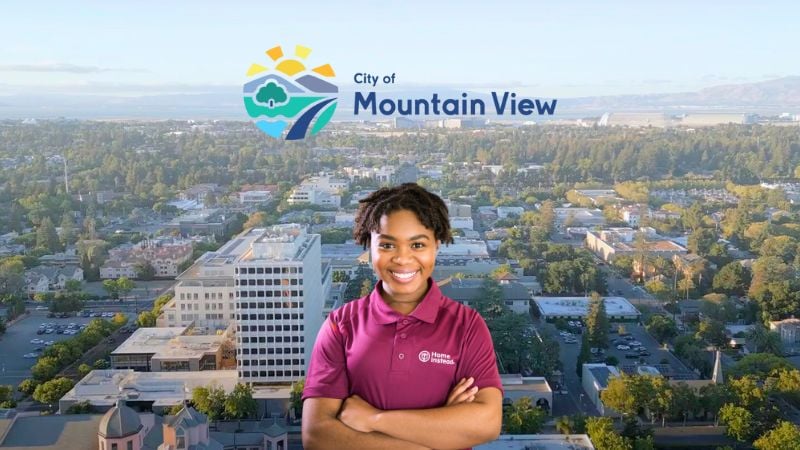 Home Instead caregiver with Mountain View California in the background