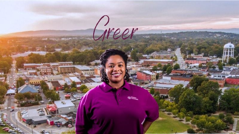 home instead caregiver with greer, sc in the background