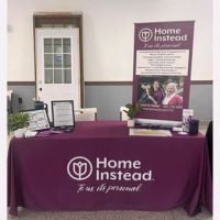 home instead booth at ndol job fair