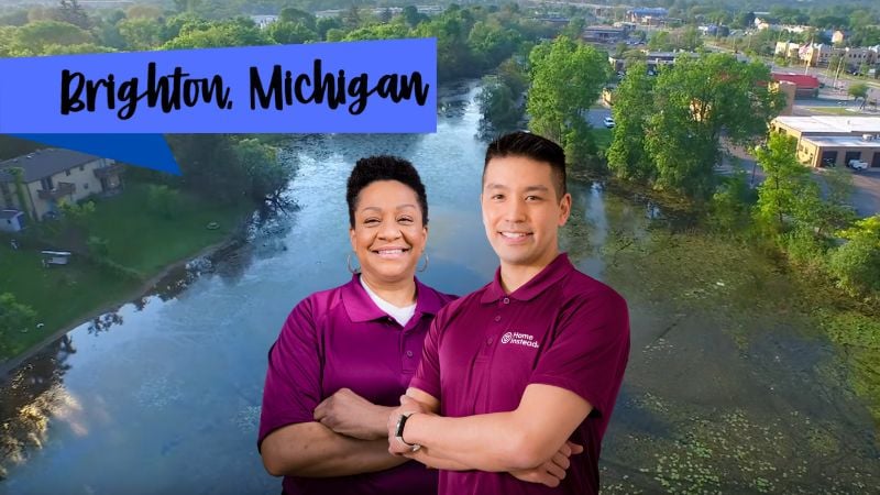 Home Instead caregiver with Brighton, Michigan in the background