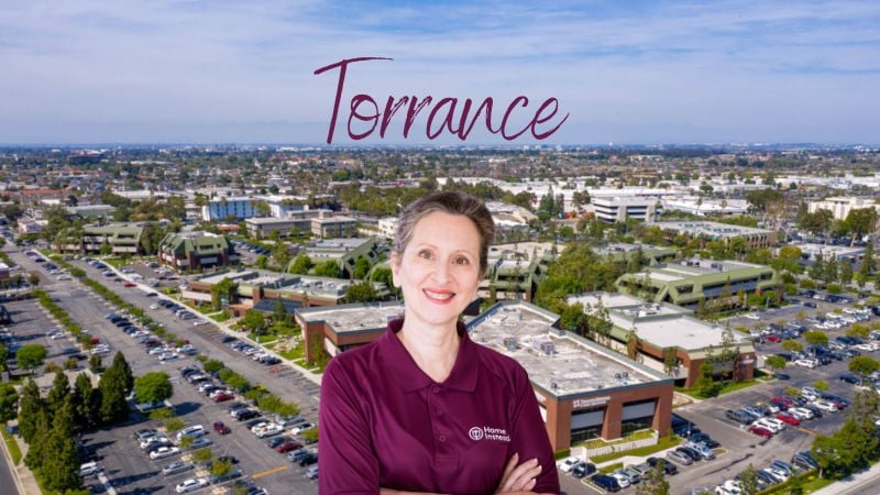 Home Instead caregiver with Torrance, CA in the background