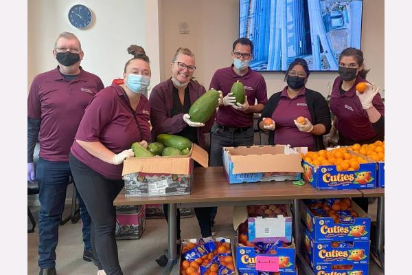 Home Instead Serves Seniors Fresh Produce at Curry Senior Center