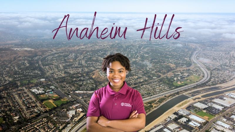 Home Instead caregiver with Anaheim Hills California in the background