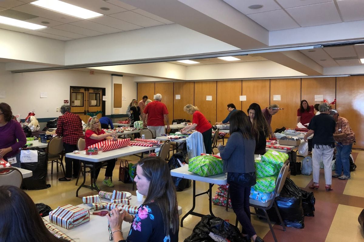 Join Home Instead 21st Annual Be a Santa to a Senior in Vista, CA wrapping party