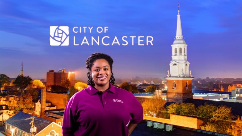 Home Instead caregiver with Lancaster Pennsylvania in the background