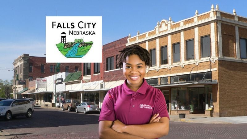 Home Instead caregiver with Falls City Nebraska in the background