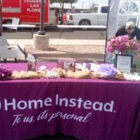 home instead booth at Farmers and Crafters Harvest Festival