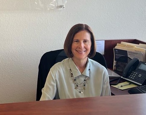 Wendy at her desk