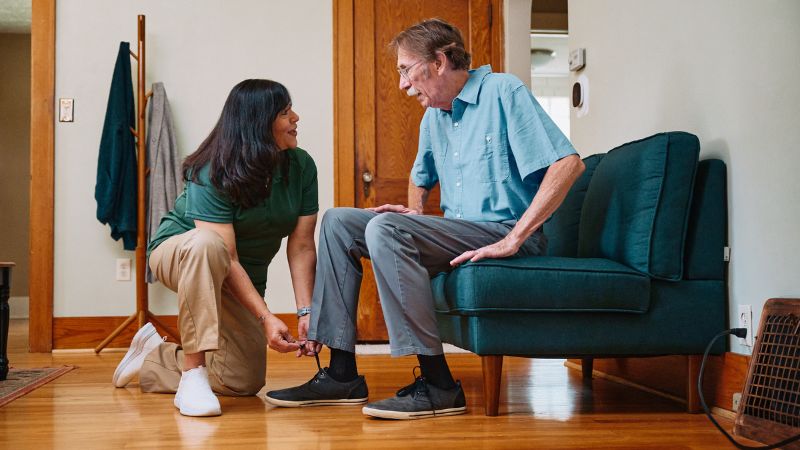 Home Instead caregiver and senior client