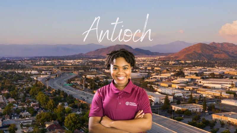 Home Instead caregiver with Antioch California in the background