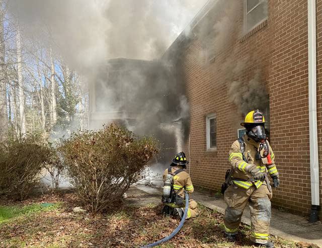 Firefighters putting out a fire