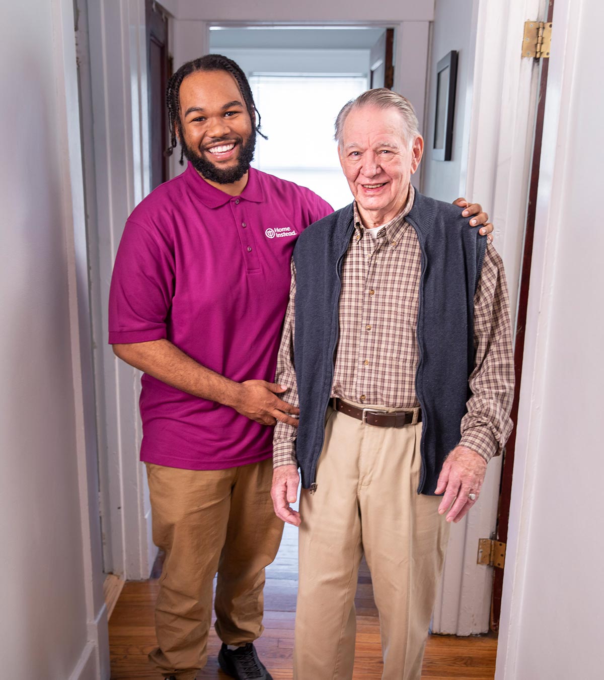 Home-Instead-CAREGiver-standing-with-senior-in-home